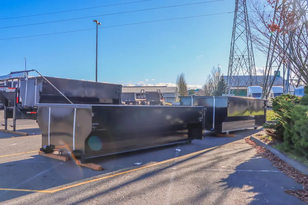 Roll-off dumpster ready for waste disposal at job site for 4 Yard Dumpster Rental in Oak Grove